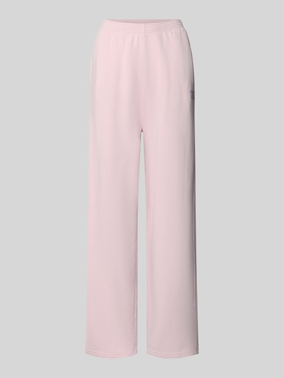 Produktfoto, Sweatpants aus reiner Baumwolle mit Logo-Print Modell 'PLIZZY' von American Vintage, zartrosa Farbton, elastischer Bund, gerade Form, sichtbare Taschen, glatte und weiche Textur, Damen Sweatpants, Straight Fit, 73 cm Innenbeinlänge in Größe S