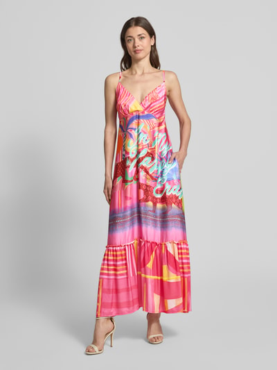 Modelka kobieca ma na sobie Maxikleid aus Viskose Modell 'Sunset Dream' od miss goodlife, kolorowy wzór, krój A-linii, czysta wiskoza, ramiączka spaghetti, dekolt serce, długość pleców w rozmiarze S: 119 cm, szerokość w rozmiarze S: 41 cm, widok całej sylwetki z przodu.