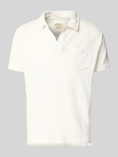 Produktfoto, Slim Fit Poloshirt aus Frottee von Superdry aus reiner Baumwolle in Unifarbenem-Design, mit offenem Kragen und Brusttasche.