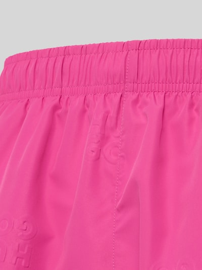 Produktfoto, Regular Fit Badeshorts mit Label-Prägung Modell 'TONAL' von HUGO in Pink, Optik: Unifarben, Elastisch, seitliche Eingrifftaschen