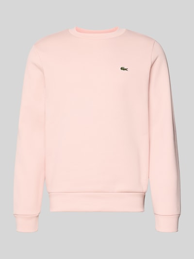 Produktfoto, Classic Fit Sweatshirt uit katoenmix van Lacoste in effen lichtroze met logostitching, ronde hals, geribde boorden, swest-materiaal.