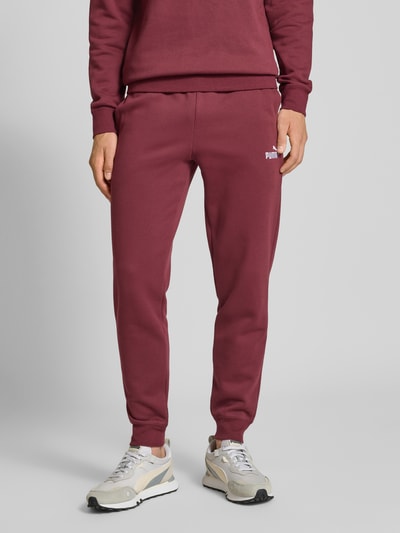 PUMA PERFORMANCE Sweatpants mit Label-Stitching und elastischem Bund Bordeaux 4