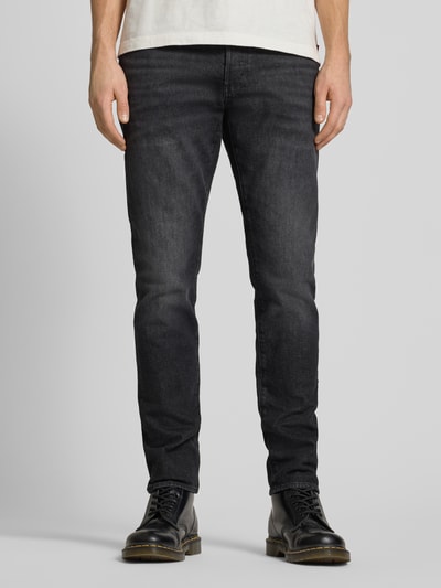 Mężczyzna nosi Jeans mit 5-Pocket-Design von G-Star Raw, czarny bawełniano-elastanowy krój slim fit, przód, zbliżenie na nogi