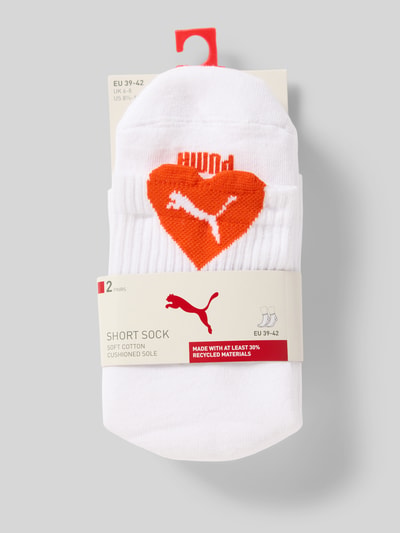 Produktfoto, weiße Socken mit orangem Herz-Logo im 2er-Pack von PUMA aus Baumwoll-Mix, körpernahe Passform, Damen Socken