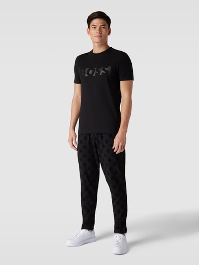 HUGO Sweatpants mit Allover-Logo-Muster Modell 'Flock' Black 1