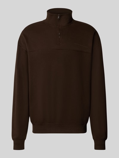 Produktfoto, braunes Relaxed Fit Sweatshirt aus Baumwoll-Modal-Mix von Tommy Hilfiger, schlichtes Design, glatte Textur.