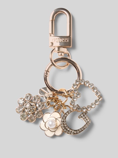 Produktfoto, Schlüsselanhänger mit Logo-Prägung Modell 'Everlee' von GUESS, goldfarben mit Strasssteinbesatz und Karabinerhaken, blumenförmige und G-förmige Anhänger, glänzende Textur, Damen Schlüsselanhänger von GUESS