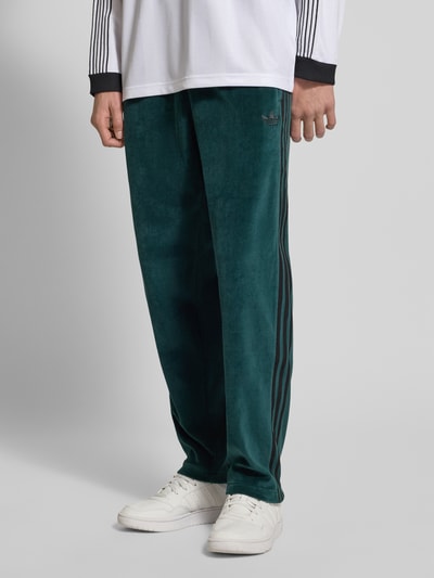 adidas Originals Spodnie dresowe z wpuszczanymi kieszeniami Ciemnozielony 4