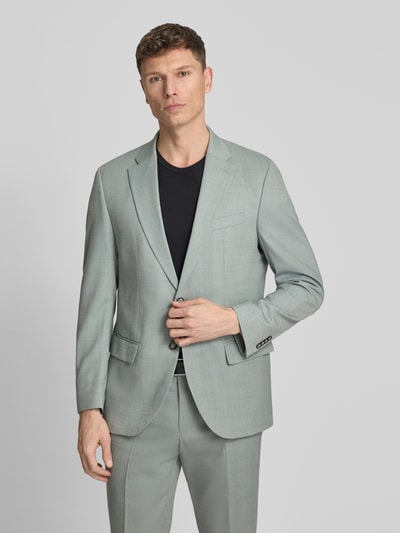 Männermodel trägt Slim Fit 2-Knopf-Sakko mit Pattentaschen Modell 'Grant' von Pierre Cardin, Schurwoll-Mix mit Stretch-Anteil, Ganzkörperansicht von vorne.