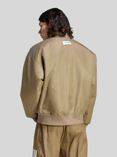 adidas Sportswear Loose Fit Blouson mit Logo-Print Modell 'STADIUM' Beige 5