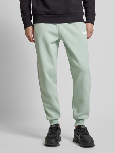 PUMA PERFORMANCE Relaxed Fit Sweatpants mit Label-Print Lind 4