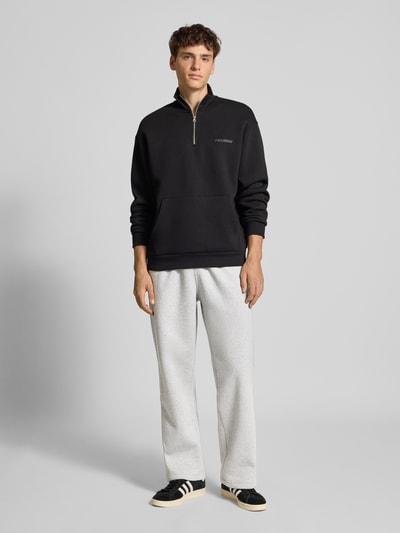 adidas Originals Spodnie dresowe z elastycznym ściągaczem Jasnoszary melanż 1