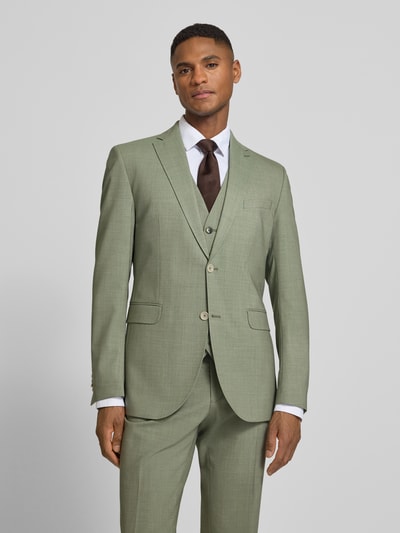 Męski model nosi Slim Fit 2-Knopf-Sakko mit Pattentaschen Modell 'Paul SV' von CG - Club of Gents, jasnozielony kolor, krój slim fit, tekstura gładka, widok całej sylwetki z przodu.