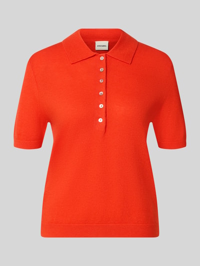 Produktfoto, Poloshirt aus reiner Wolle von Stefanel in leuchtendem Orange, taillierte Passform, Polokragen, gerippte Abschlüsse, Rückenlänge 55 cm.