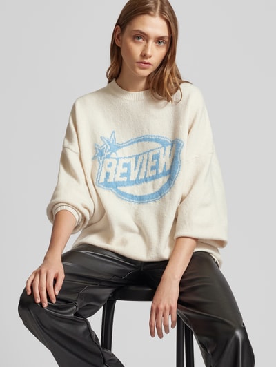 Review Oversized Strickpullover mit Label-Detail Offwhite Melange 3