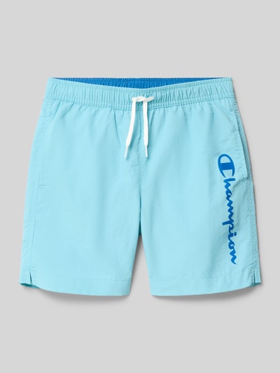 Produktfoto, Badehose mit Eingrifftaschen und Logo-Print van CHAMPION voor kinderen, loose fit, elastische band met trekkoord, zij-steekzakken, logoprint, lichtblauw met witte en blauwe details