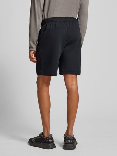 Under Armour Relaxed Fit Sweatshorts mit Logo-Print Modell 'Unstoppable' Black 5