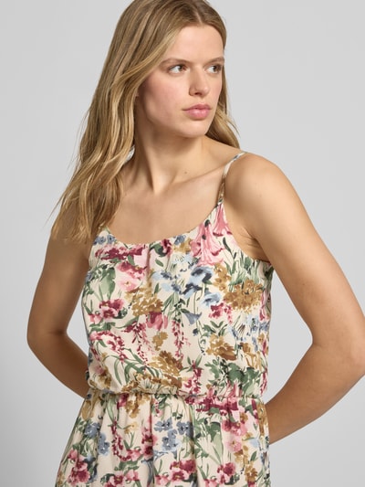 Frauenmodel trägt Maxikleid aus Crêpe Modell 'WINNER LIFE' von Only, florales Allover-Muster, verstellbare Spaghettiträger, Nahaufnahme Oberkörper.
