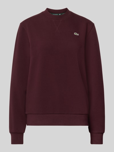 Produktfoto, Relaxed Fit Sweatshirt aus Baumwoll-Mix von Lacoste in Dunkelrot mit glatter Textur und kleinem Markenlogo auf der Brust. Damen Sweatshirt von Lacoste.