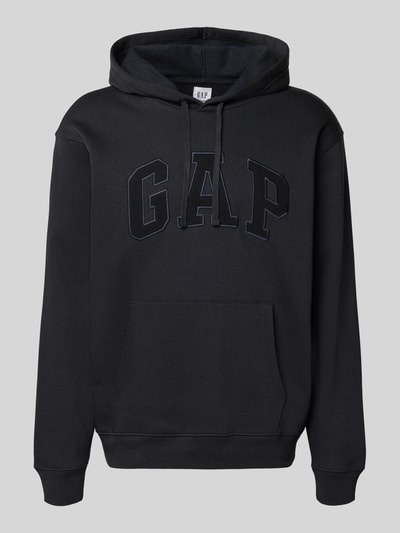 Productfoto, Hoodie met Logo-Detail en Känguru-Tasche van GAP in zwart, katoenmix, loose fit, capuchon met trekkoord, geribbelde boorden, kangoeroezak.