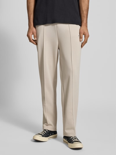PEGADOR Spodnie dresowe z wyhaftowanym logo model ‘Motus Track Pants’ Écru 4