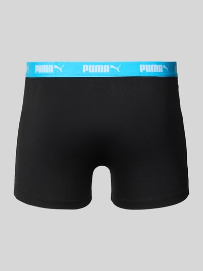 Produktfoto, Trunks im 4er-Pack mit elastischem Logo-Bund von PUMA in Schwarz mit blauem Logo-Bund, Baumwoll-Mix mit Stretch-Anteil, Körpernaher-Schnitt