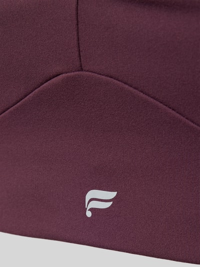 Produktfoto, Detailaufnahme vom Sport-BH mit Logo-Print Modell 'PURELUXE LONGLINE' von Fabletics, bordeaux, glatte Struktur, Stretch-Material