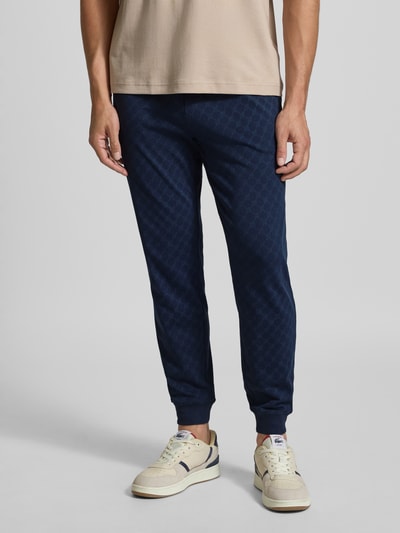 JOOP! Collection Spodnie dresowe męskie JOOP! Collection;Czysta bawełna;Dopasowany krój;Elastyczny pas z trokami;Prążkowane wykończenia;Długość wewnętrzna nogawki w rozmiarze M: 43 cm Granatowy 4