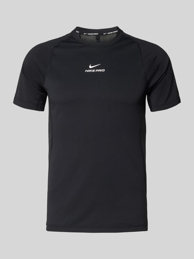 Produktfoto, T-Shirt mit Logo-Print und Raglanärmeln von NIKE TRAINING, Herren T-Shirt in Schwarz, Straight Fit, Rundhalsausschnitt, Rückenlänge 71 cm bei Größe M