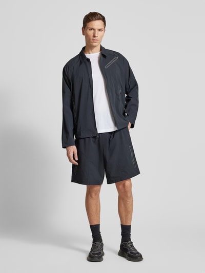 Under Armour Relaxed Fit Shorts mit Reißverschlusstaschen Modell 'Unstoppable' Black 1