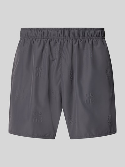 Produktfoto, Regular Fit Badeshorts mit Label-Prägung Modell 'TONAL' von HUGO in Grau, Optik: Unifarben, elastischer Bund, seitliche Eingrifftaschen.
