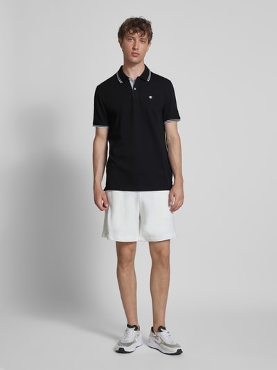 CHAMPION Regular Fit Poloshirt mit Logo-Stitching Black 1