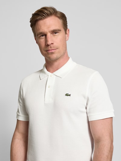 Lacoste Koszulka polo o kroju slim fit z naszywką z logo Złamany biały 3