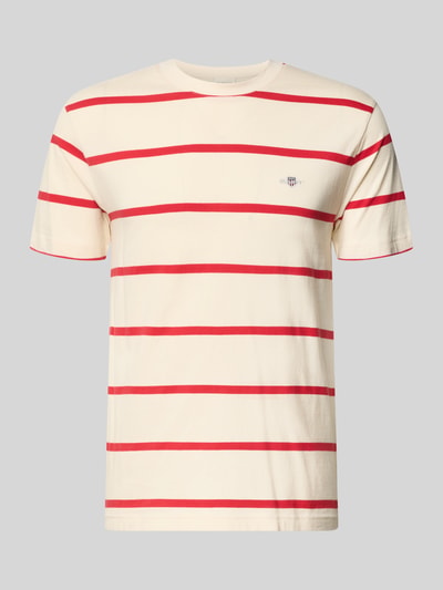 Produktfoto, Regular Fit T-Shirt mit Logo-Stitching von Gant aus reiner Baumwolle, Rundhalsausschnitt, creme mit roten Streifen, Rückenlänge 68 cm in Größe M