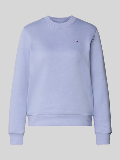 Produktfoto, Regular Fit Sweatshirt aus Baumwoll-Mix von Tommy Jeans w kolorze jasnofioletowym, fason prosty, logo z przodu, materiał bawełniany.