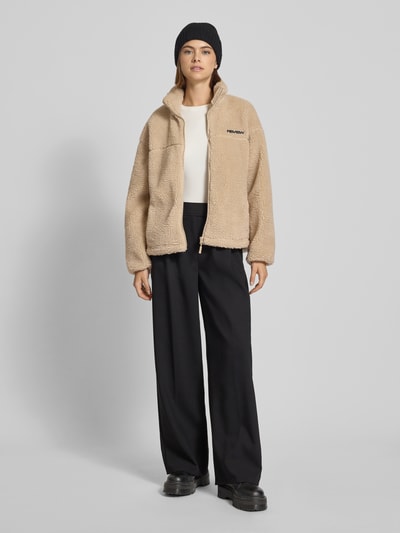 Review Kurtka polarowa ze stójką i detalem z logo Écru 1