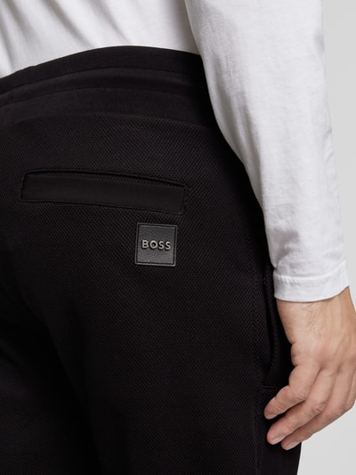 BOSS Slim fit sweatpants met structuurmotief, model 'Lamont' Zwart - 3