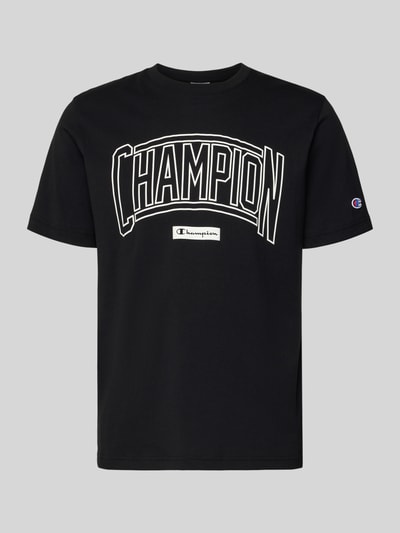 Produktfoto, T-Shirt mit Logo und Rundhalsausschnitt von CHAMPION in Schwarz, Reine Baumwolle, Regular-Fit, großes Logo, Label-Stitching