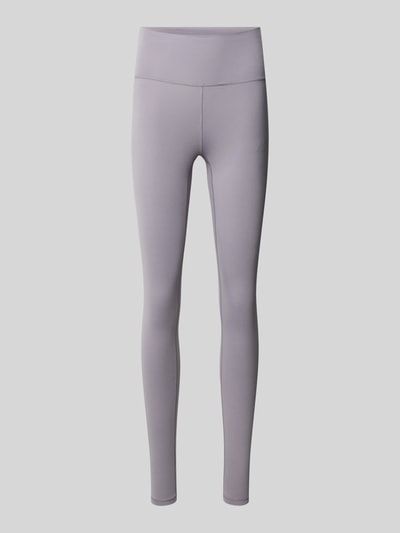 Produktfoto, schlanke Slim Fit Leggings mit Logo-Print Modell 'Harmony' von New Balance in Hellgrau, glatte Jersey-Oberfläche, elastischer Bund.