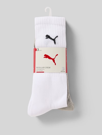 Produktfoto, Sportsocken im 3er-Pack von PUMA im Unifarbenes-Design mit Strukturmuster, Label-Stitching, Baumwoll-Mix mit Stretch-Anteil.