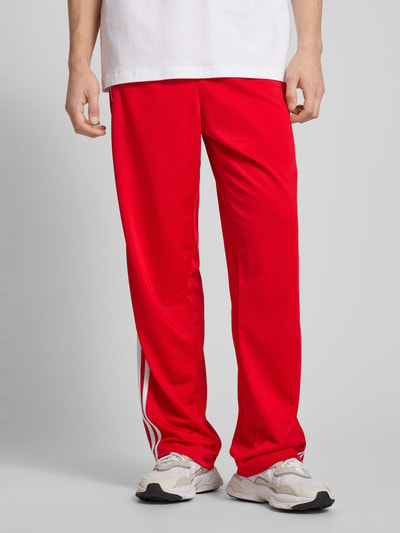 adidas Originals Spodnie dresowe z wyhaftowanym logo model ‘FIREBIRD’ Czerwony 4