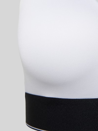 Produktfoto, Slim Fit Bralette mit Logo-Stitching von Calvin Klein Underwear in Weiß mit elastischem Material-Mix und schwarzem Bund, Detailaufnahme
