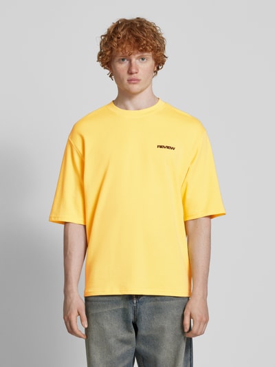 REVIEW Oversized T-Shirt mit Label-Print Pastellgelb 4