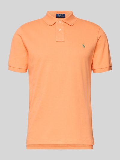 Produktfoto, Slim Fit Poloshirt aus reiner Baumwolle von Polo Ralph Lauren in Optik: Unifarben mit Label-Stitching-Applikation, Polo-Kragen, kurzer Knopfleiste, Kurzarm, gerippter Ärmelabschluss, asymmetrischem Rumpfabschluss, Piqué-Materialverarbeitung.