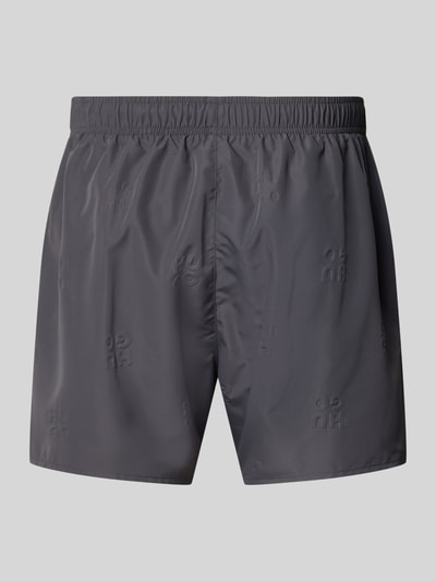 Produktfoto, Regular Fit Badeshorts mit Label-Prägung Modell 'TONAL' von HUGO in Optik: Unifarben, elastischer Bund, seitliche Eingrifftaschen, glatte Textur.