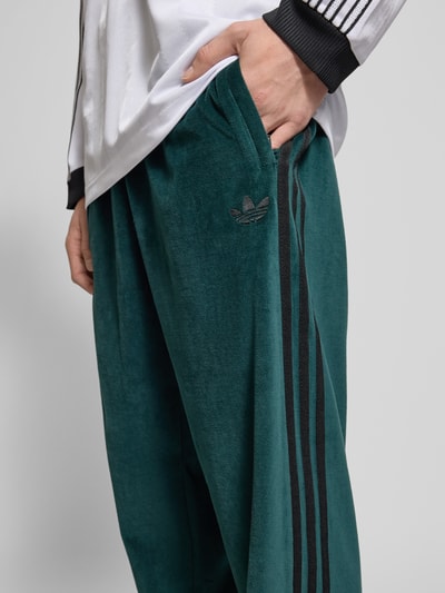 adidas Originals Spodnie dresowe z wpuszczanymi kieszeniami Ciemnozielony 3
