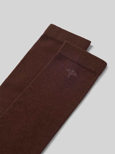 Produktfoto, Kniestrümpfe aus Baumwoll-Mix von JOOP! COLLECTION in Dunkelbraun mit dezentem Logo, strukturierte glatte Oberfläche.