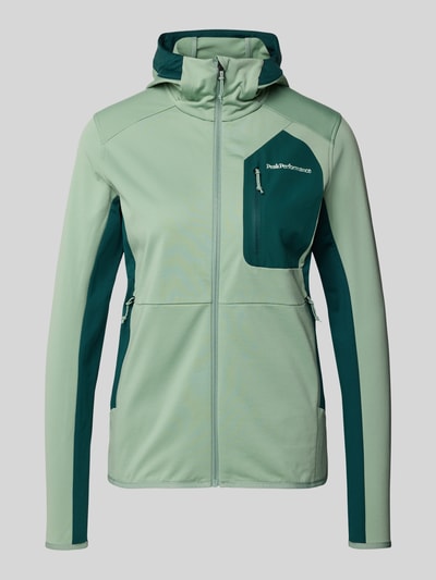 Produktfoto, Jacke mit Logo-Stitching von PEAK PERFORMANCE in hellem und dunklem Grün, Kapuze, Reißverschluss, elastischer Material-Mix, körpernahe Passform, Brusttasche