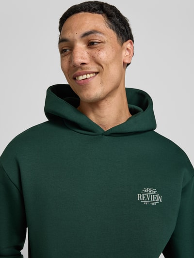 REVIEW Hoodie mit Logo-Print und Känguru-Tasche Dunkelgruen 3