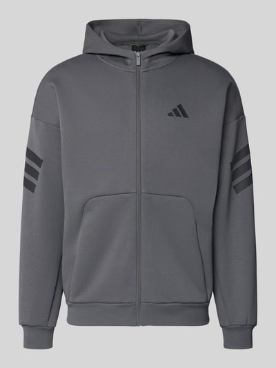 Produktfoto, Sweatjacke mit Kapuze von adidas Sportswear in Grau, Baumwoll-Mix, lockerer Schnitt, Label-Print, gerippte Abschlüsse.